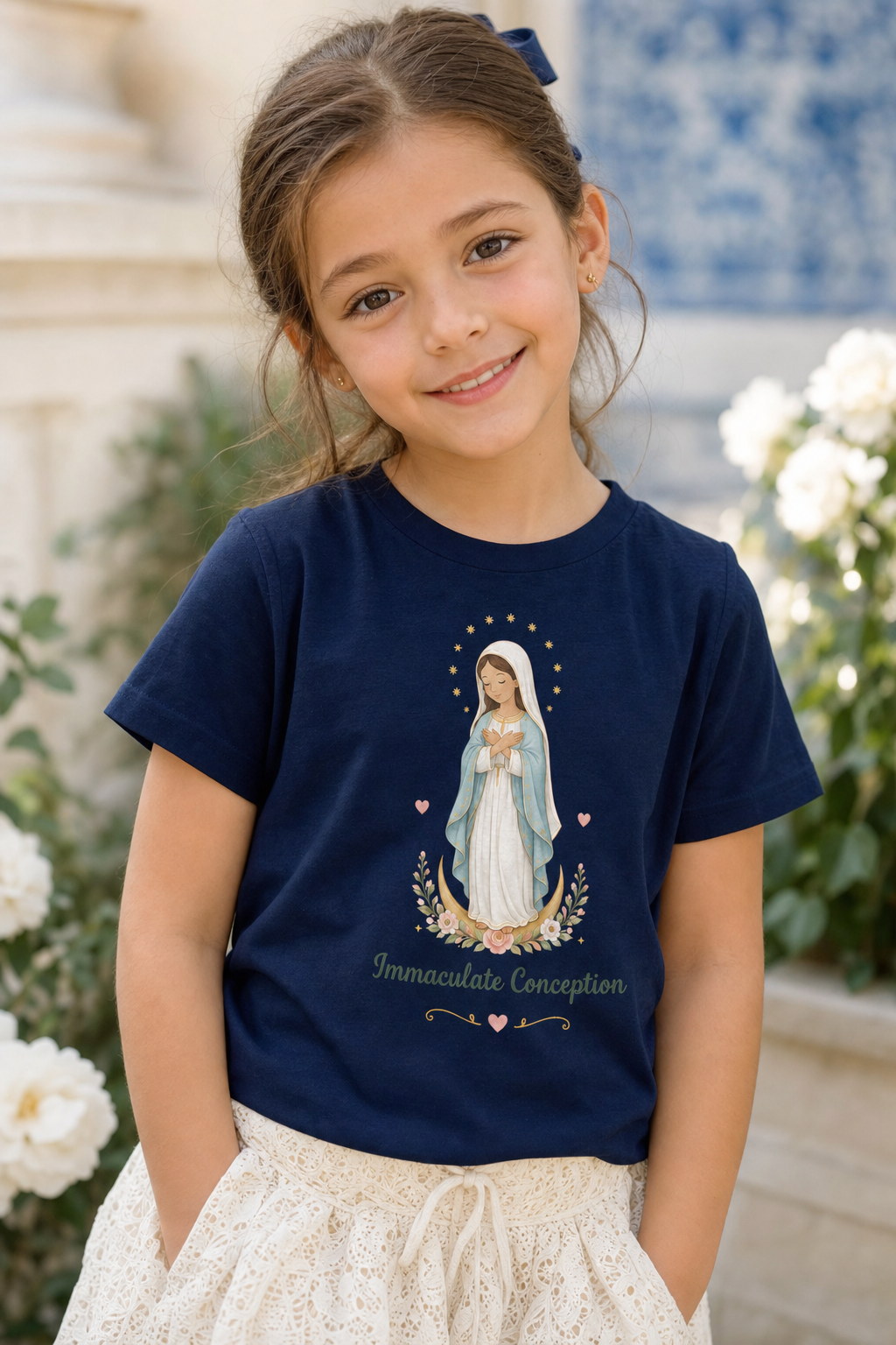 Girl wearing the Immaculate Conception Girls T-shirt in a lifestyle setting — detail