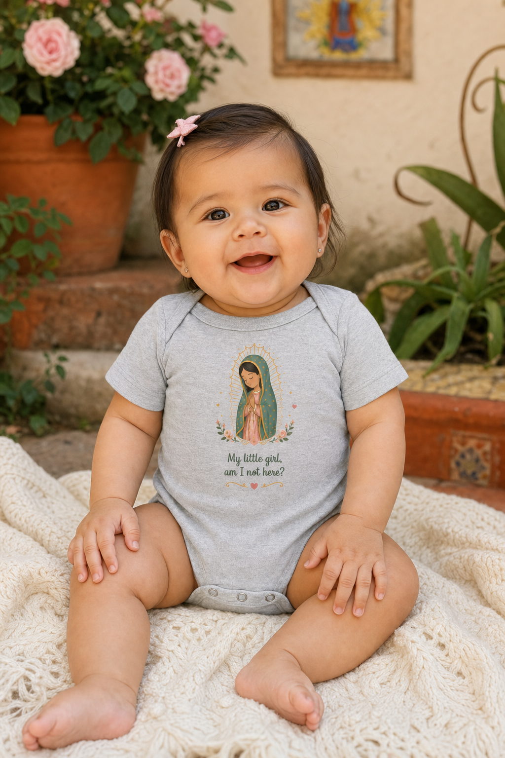 Baby girl wearing the My Little Girl Guadalupe bodysuit in a lifestyle setting