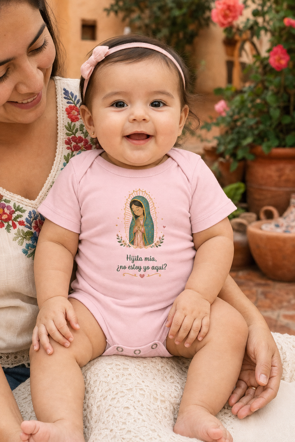 Baby girl wearing the Hijita Mía Guadalupe bodysuit in a lifestyle setting — detail