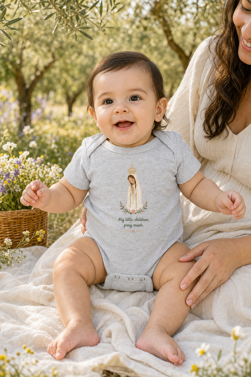 Baby girl wearing the Pray Much Fátima bodysuit in a lifestyle setting