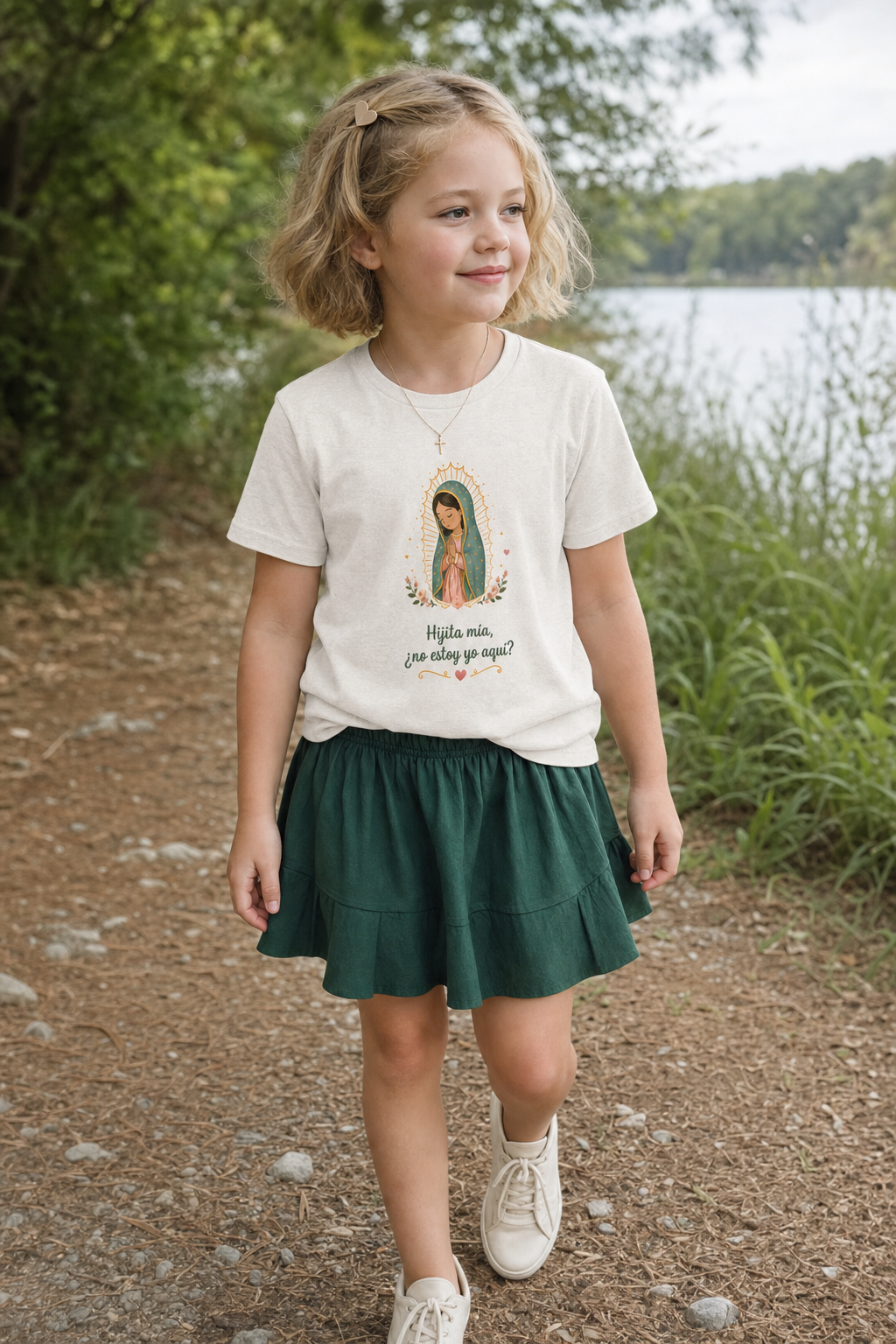 Girl wearing the Hijita Mía Guadalupe Girls T-Shirt in Heather Dust