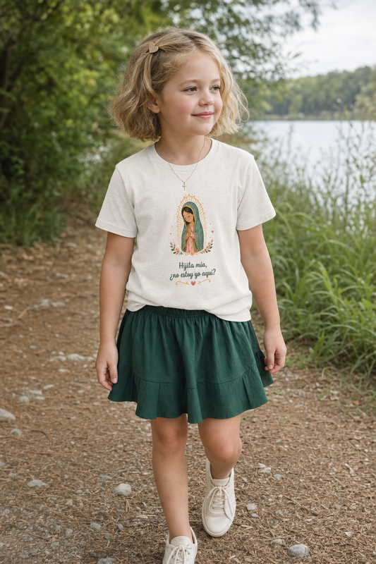 Girl wearing the Hijita Mía Guadalupe Girls T-Shirt in Heather Dust