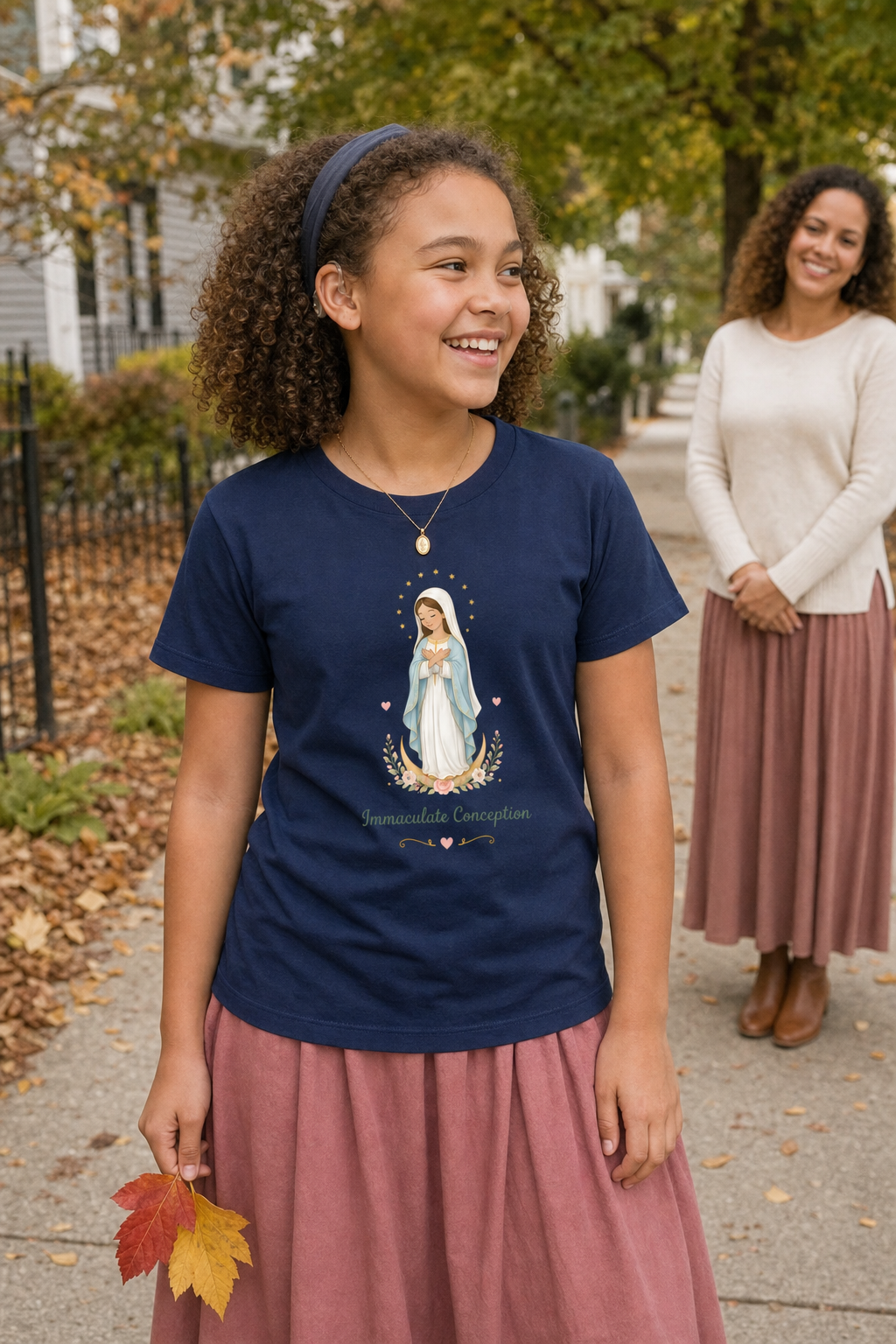 Girl wearing the Immaculate Conception Girls T-Shirt in Navy