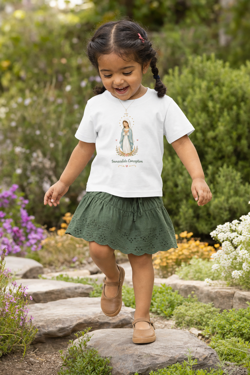 Little girl wearing the Immaculate Conception Toddler T-Shirt in White