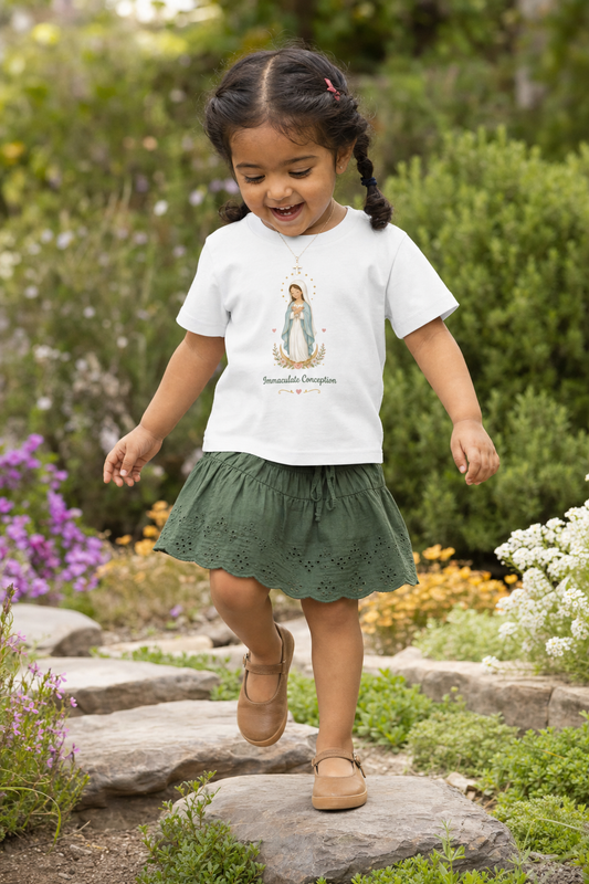 Little girl wearing the Immaculate Conception Toddler T-Shirt in White