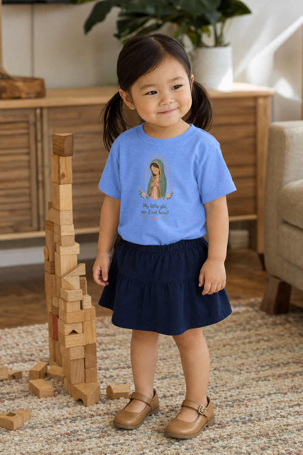 Little girl wearing the My Little Girl Guadalupe Toddler T-Shirt in Heather Columbia Blue