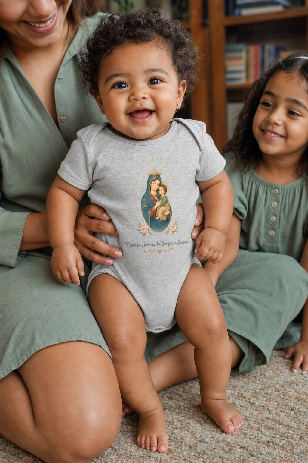 Baby girl wearing the Nuestra Señora del Perpetuo Socorro Baby Bodysuit in Athletic Heather