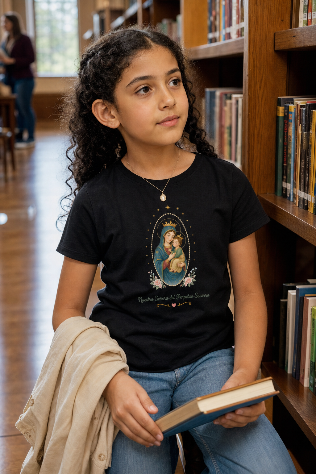 Girl wearing the Nuestra Señora del Perpetuo Socorro Girls T-Shirt in Black