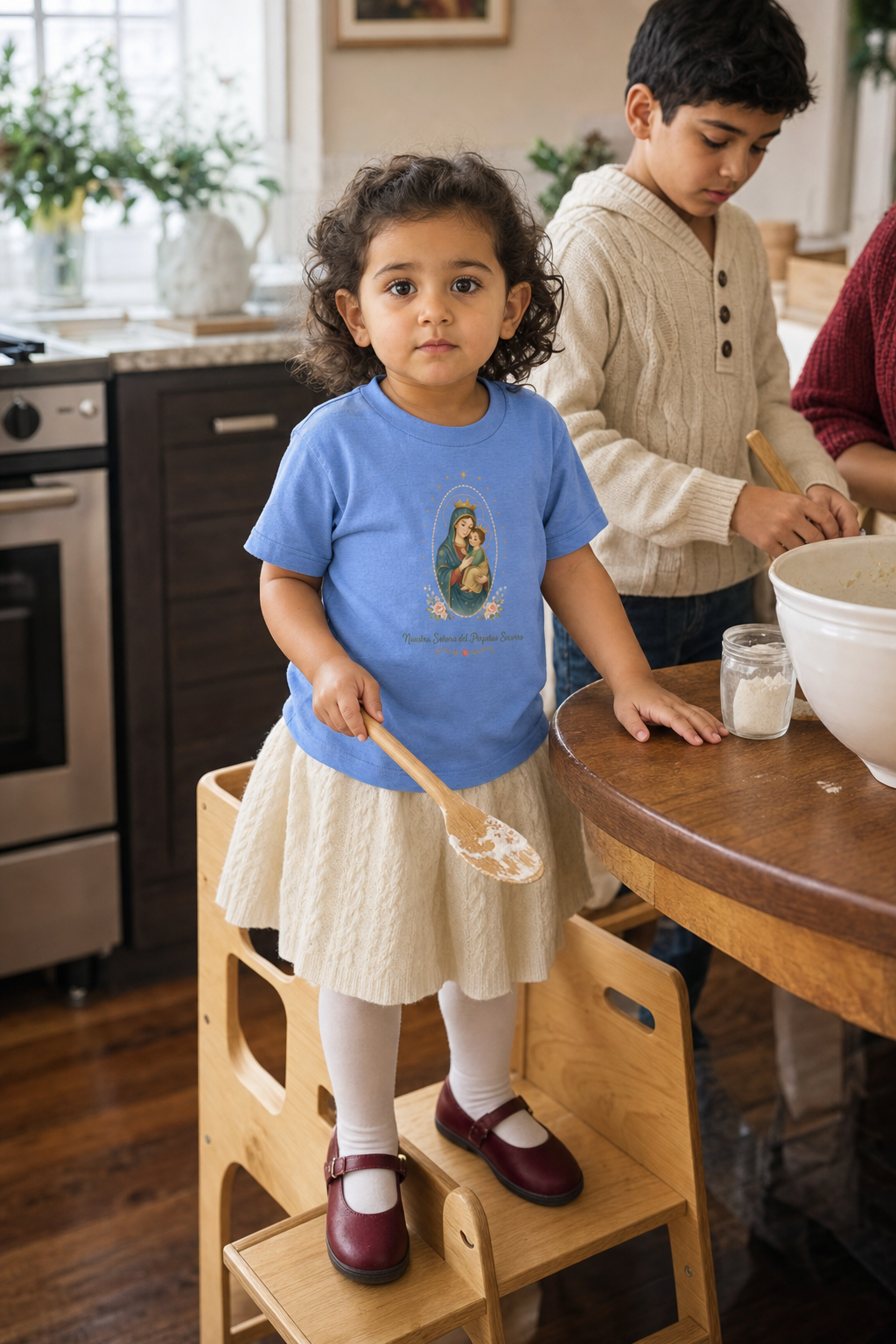 Little girl wearing the Nuestra Señora del Perpetuo Socorro Toddler T-Shirt in Heather Columbia Blue