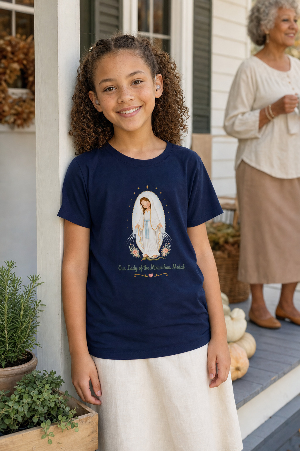 Girl wearing the Our Lady of the Miraculous Medal Girls T-Shirt in Navy