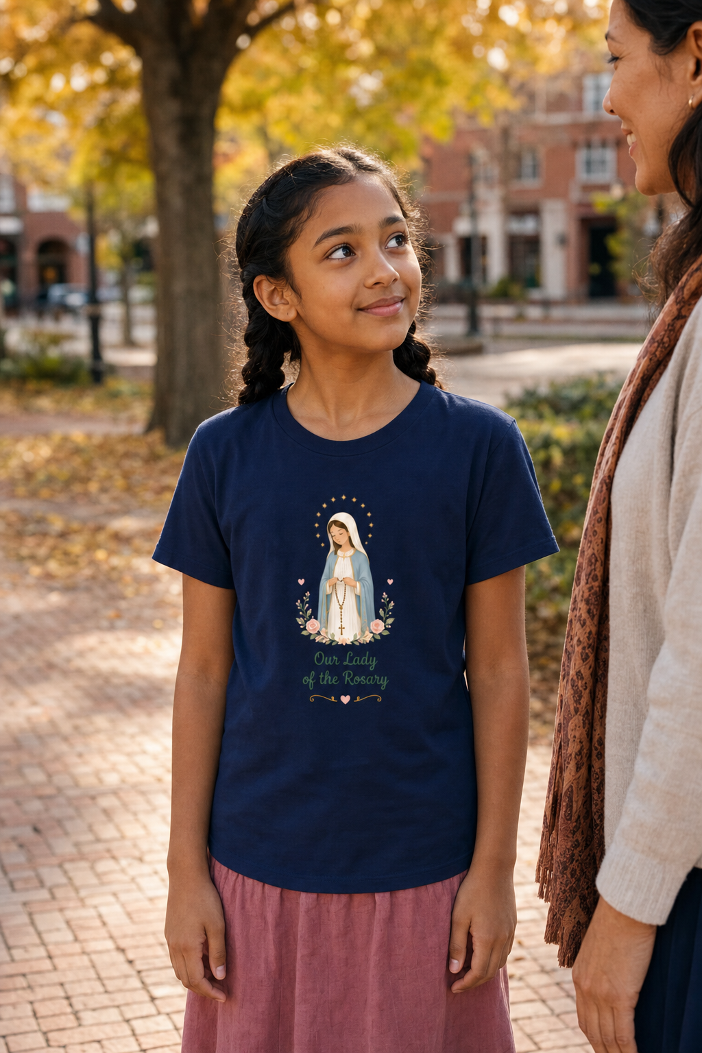 Girl wearing the Our Lady of the Rosary Girls T-Shirt in Navy