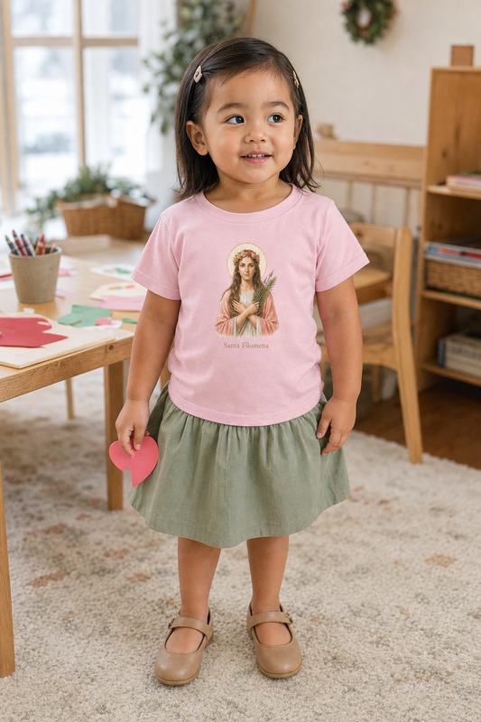 Little girl wearing the Santa Filomena Toddler T-Shirt in Pink