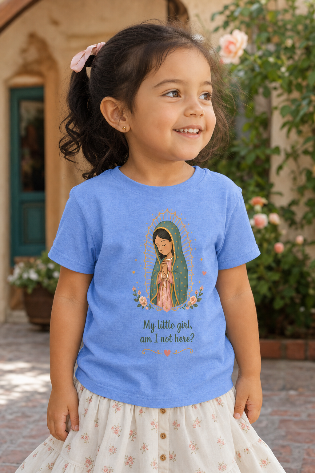 Little girl wearing the My Little Girl Guadalupe toddler T-shirt in a lifestyle setting — detail