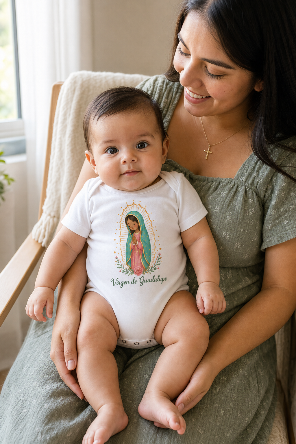 Baby girl wearing the Virgen de Guadalupe Baby Bodysuit in White