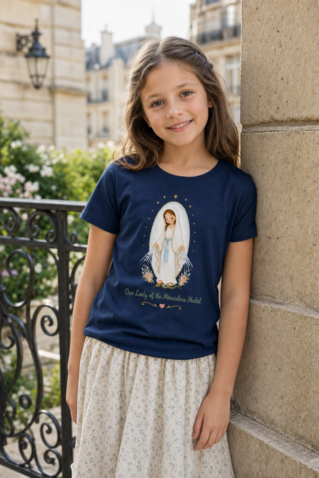Girl wearing the Our Lady of the Miraculous Medal Girls T-shirt in a lifestyle setting