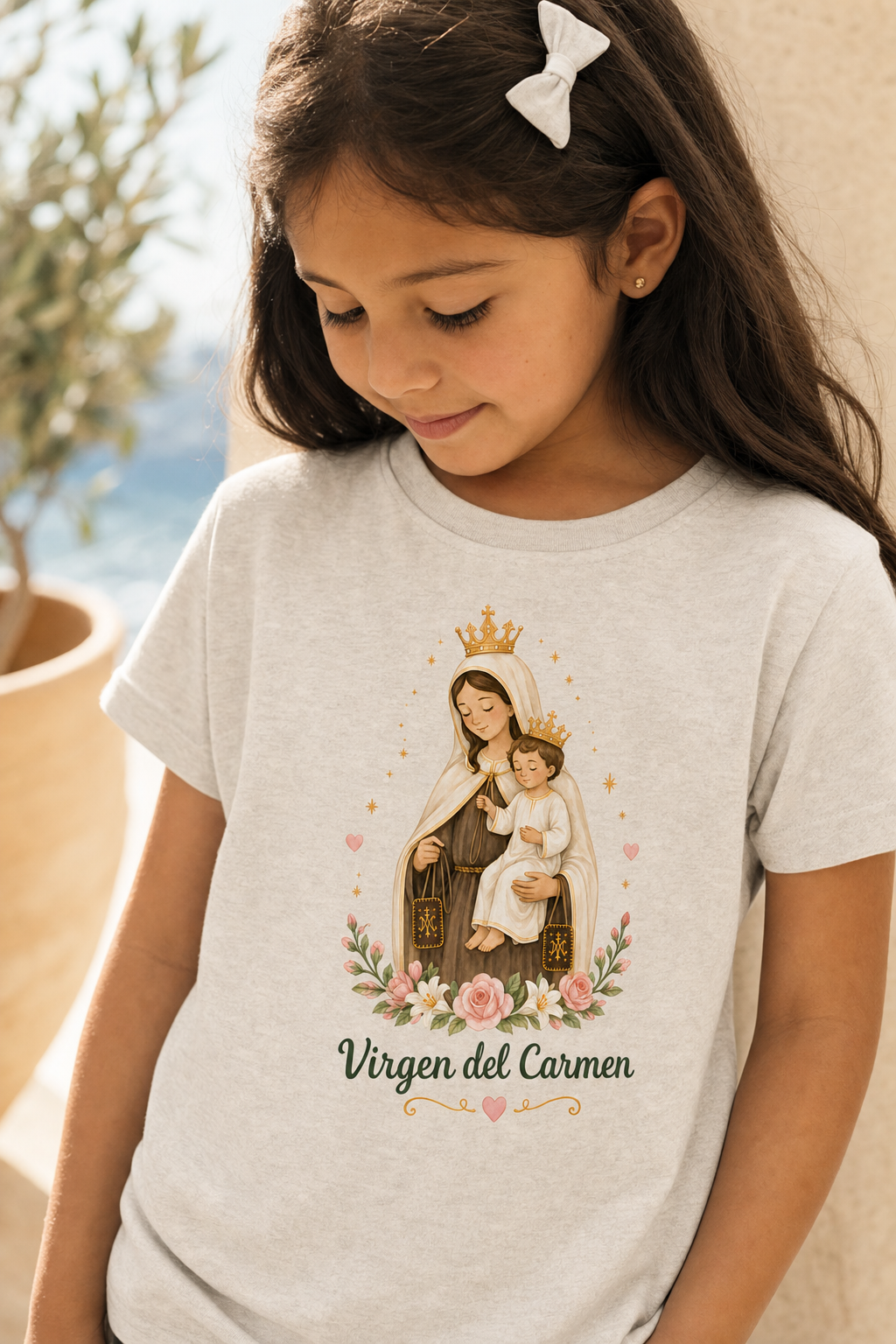 Girl wearing the Virgen del Carmen Girls T-shirt in a lifestyle setting — detail